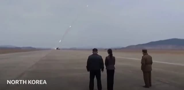 Kim Jong Un Oversees Missile Launch with Daughter