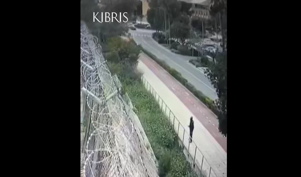 Video: Man in Black Throws Firecrackers Towards Occupied Territories