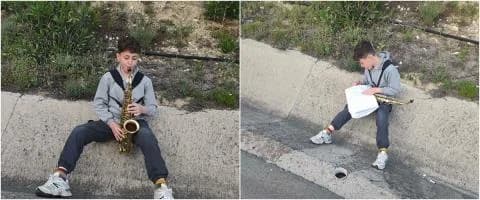 Young Panagiotis: Saxophone Lesson Amid Highway Blockade