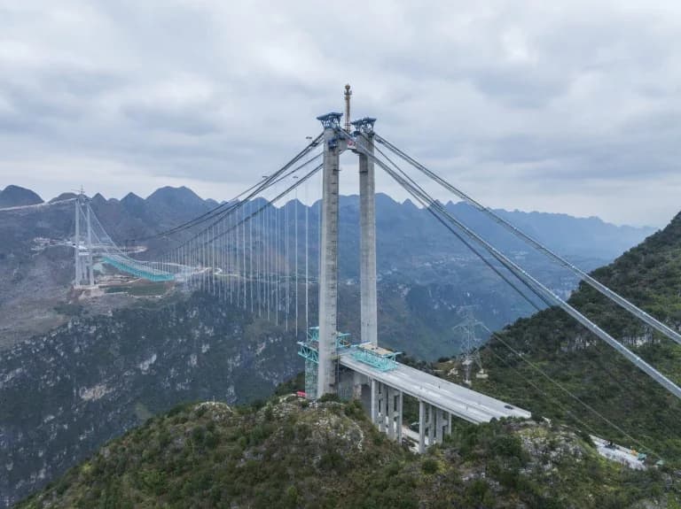 China Building World's Tallest Bridge, Cutting Through Mountain Range