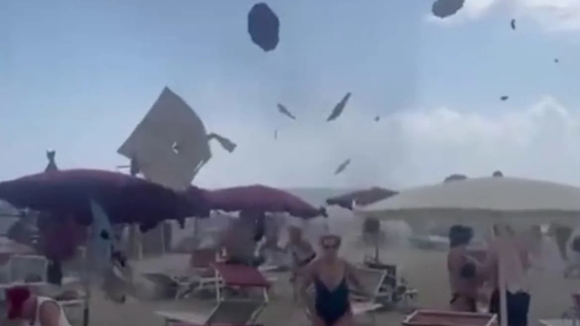 Whirlwind Sweeps Italian Beach – Bathers Scramble for Safety