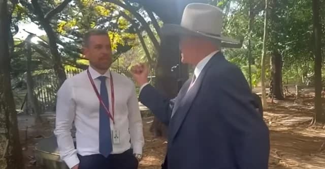 Australian MP Threatens Journalist with Punch at Press Conference