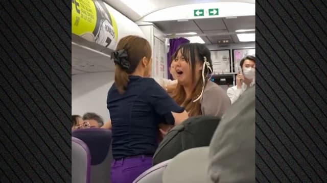 Vietnam Flight Disturbance: Woman Removed for Arguing