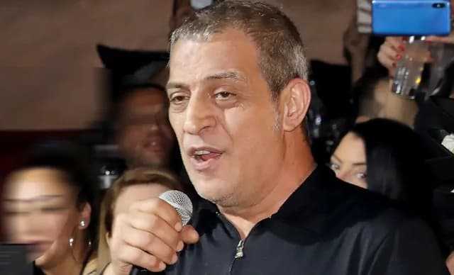 Themis Adamantidis: Relación con el presunto líder de la red de usura