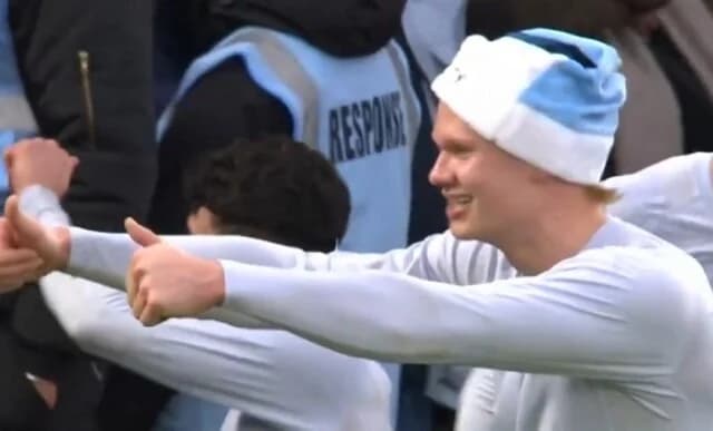 Haaland Celebrates City's Win with Santa Hat