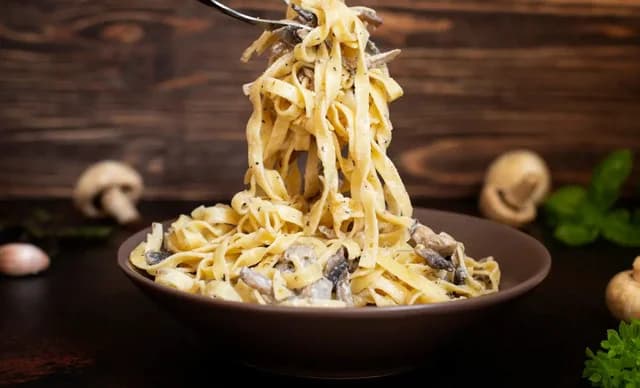 Rezept für köstliche Fettuccine mit Pilzen