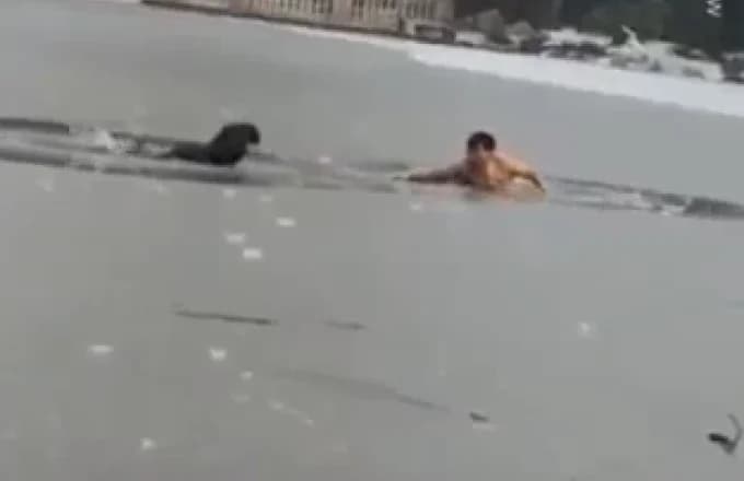 China: Man Rescues Child from Frozen Lake – Rescuer at Risk (Video)
